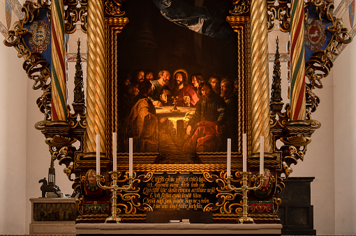 Ornated wooden altarpiece with a painting of the Last Supper, Sorø, Denmark, July 29, 2023