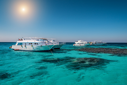 Tourist cruise boat anchored in Red Sea. Summer vacation theme