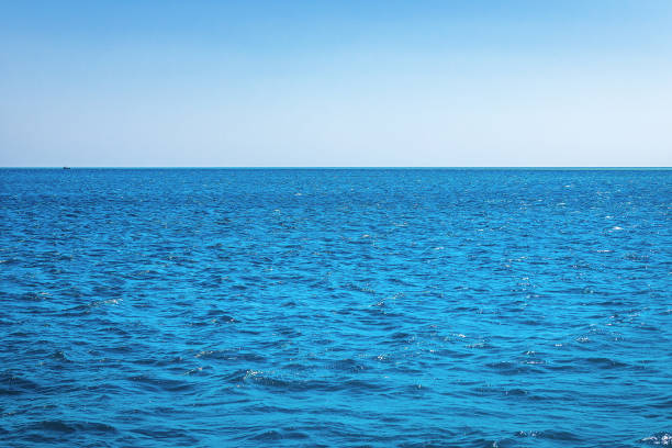 istock Blue calm sea water and sky 1598269074