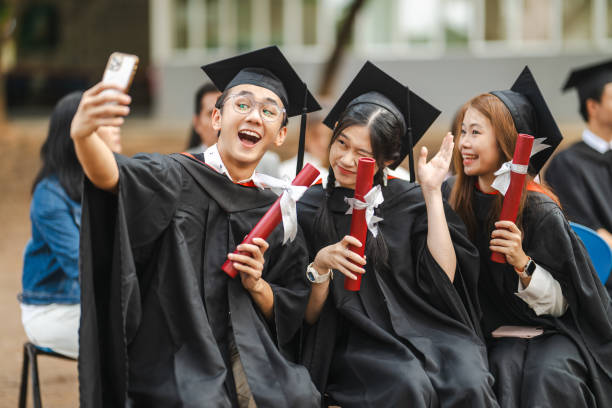 Side by Side Through Studies and Success: Our Graduation Story stock photo