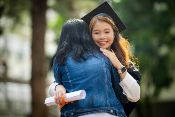 istock Embracing Achievement: A Mother's Pride on Graduation Day 1598339852