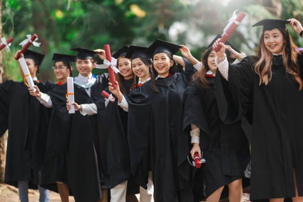 istock Triumphant Together: Young Asian Graduates Celebrate Success 1598344959