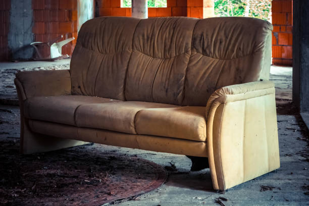 istock an old sofa in a lost place 1598345446