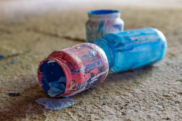 istock old glass jars with used paint 1598345451