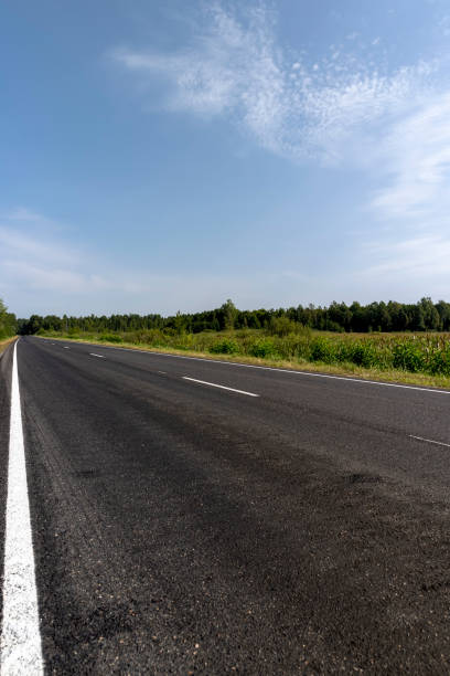 istock Narrow paved road for cars 1598347003