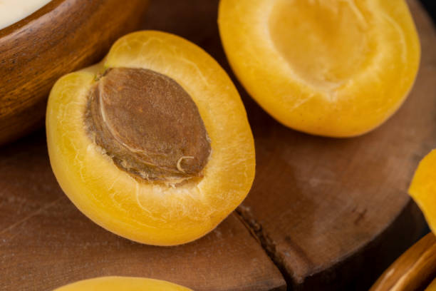 istock ripe yellow apricots on the table close-up 1598347843