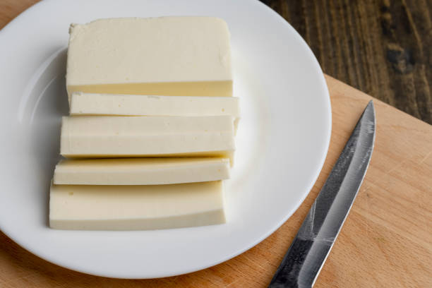 istock Sliced cream cheese for salads 1598348424