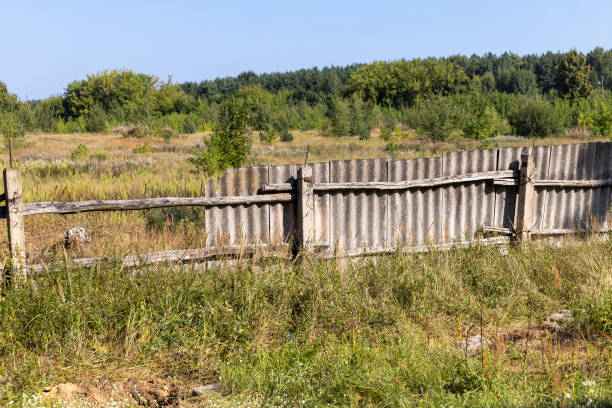 istock Damaged fence to ensure security 1598353576