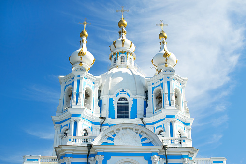 Saint Petersburg, Russia - August 28, 2021: Smolny Cathedral against the blue sky. Baroque style Orthodox church