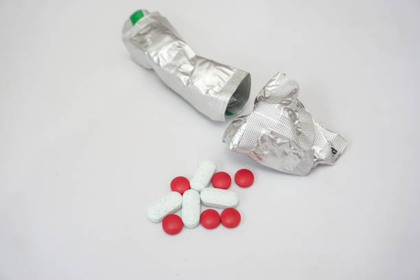 istock Red-white antibiotic capsule pills 1598370689