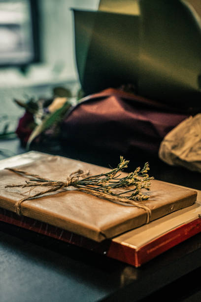 istock gift wrapping with dried flowers 1598403487