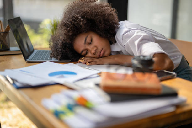 istock Fell asleep on the desk. tired from work. 1598412832