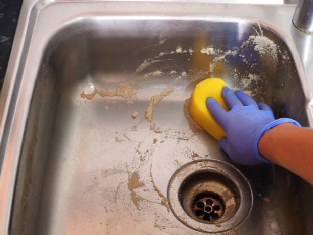 istock Vinegar and baking soda, sponge for cleaning kitchen sink 1598442255