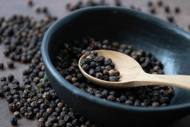 istock Healthy Lifestyle, Close up Black Peppers on Rustic background 1598448614