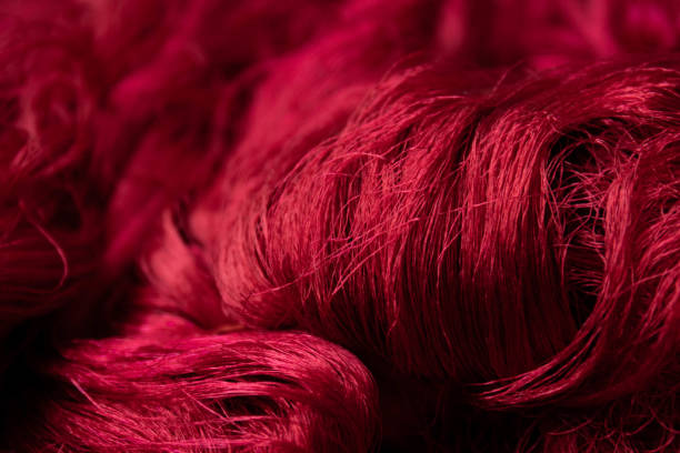 istock close up red silk yarn for background 1598450237