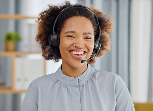 Call center, smile and portrait of woman in office, sales and telemarketing in headset at help desk. Consulting, networking and happy face of virtual assistant, customer service agent or care advisor