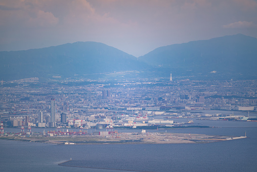 I took a photo of the current state (as of August 2023) of the Osaka Expo site from the summit of Mount Rokko in Kobe, Japan. The construction has been significantly delayed beyond the original schedule, which makes me worry if the Expo can be held as planned.