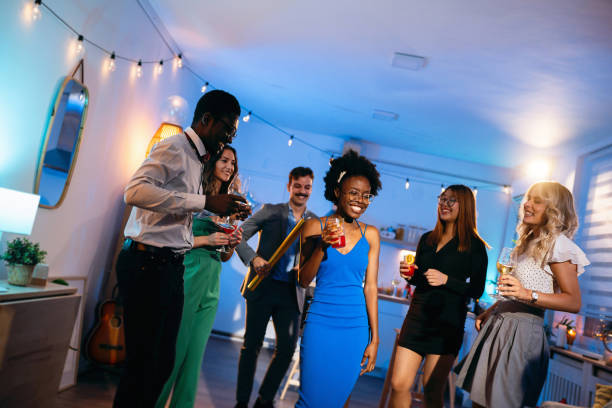 istock Multiracial people having fun during a house party 1598474692