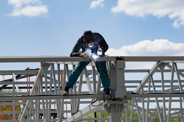 istock man welds at the factory 1598485756