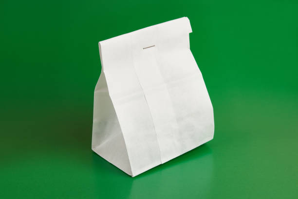 istock Paper bag with coffee beans, sewn with thread. Dry food packaging. 1598560008