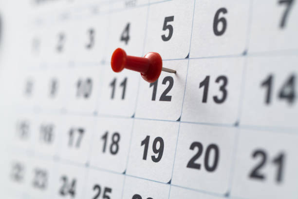 istock Embroidered pins on a calendar 1598563045