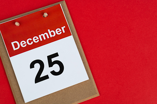 December 25 calendar on red background.