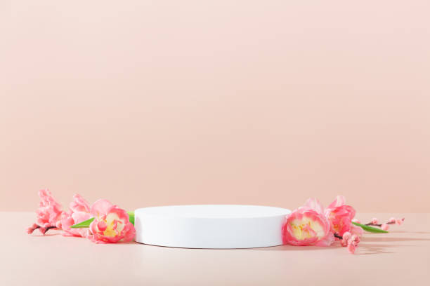 istock Abstract empty white podium on pink background. Mock up stand for product presentation. 3D Render. Minimal concept. Advertising template 1598567941