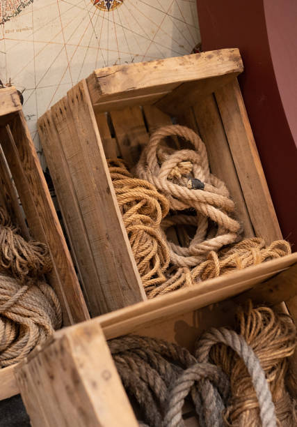 Wooden Crate with Slats and Red Wall Background
