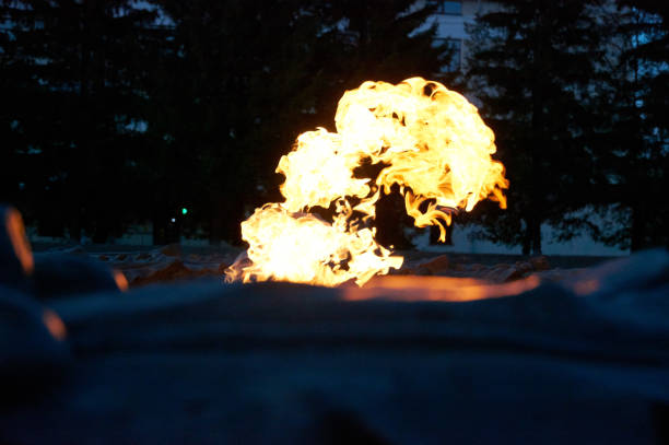 istock Eternal flame. Flame in the dark 1598604616