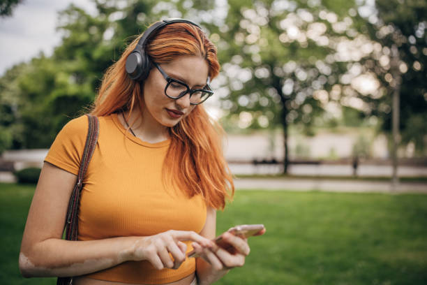 istock Modern woman with headphones 1598625255