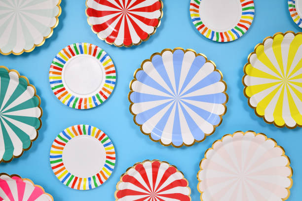 istock Different colorful striped paper party plates 1598631850