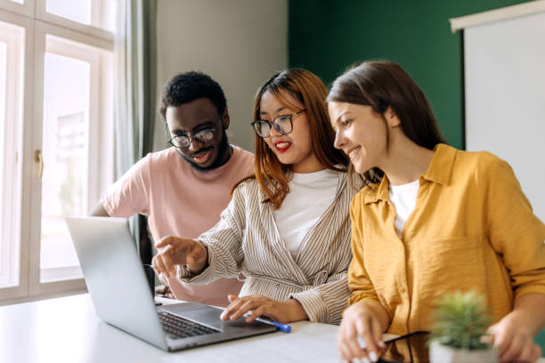istock Young colleagues working together at the modern office 1598675475