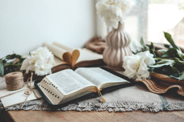istock Open bible in home morning interior 1598691899
