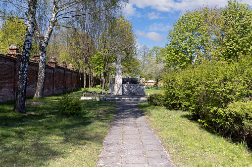 Lodz, Poland - May 4, 2023: Lodz Jewish Cemetery,  tombstones and mass graves of victims of the Lodz Ghetto (Litzmannstadt Ghetto). Memorial dedicated to the Holocaust victims