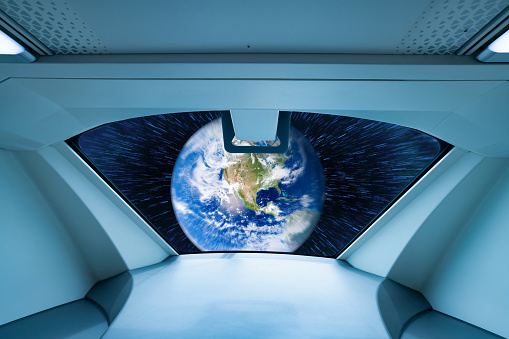 Window view of alien spaceship. UFO or unidentified flying objects. Alien invasion. Space travel. Alien spaceship and extraterrestrial technology. Futuristic spacecraft. Earth image provided by Nasa.