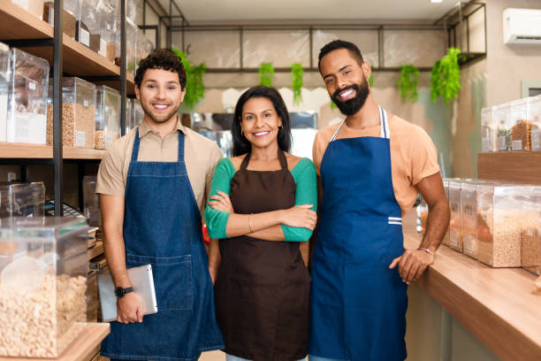 istock Service team posing for portrait at store 1598752721