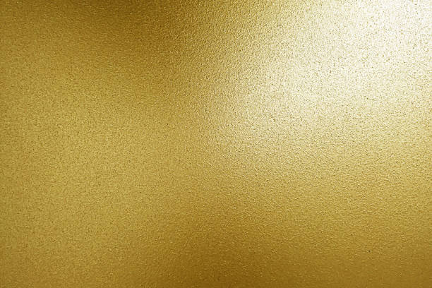 istock golden shiny gradient background. golden paper with metallic effect. 1598763959