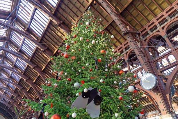 istock tall christmas tree decorated with colorful balls. 1598765617