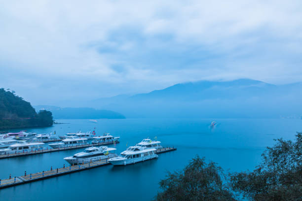 Sun Moon Lake is a beautiful freshwater lake located in the mountains of central Taiwan, near the city of Taichung. It is one of the most popular tourist destinations in Taiwan, known for its scenic beauty, cultural significance, and outdoor activities.