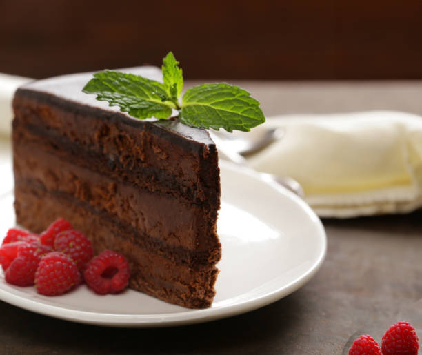 istock chocolate cake brownie pie with fresh berries dessert 1598810308