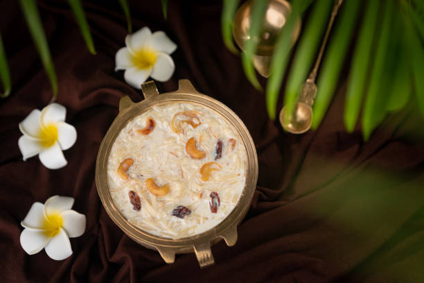 istock Onam and Vishu special payasam image with flowers on the background 1598816821