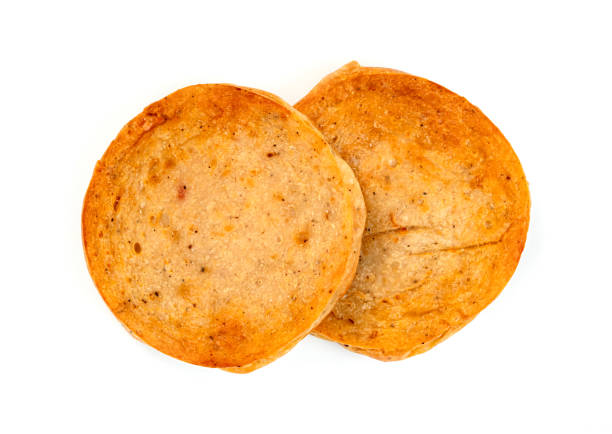 istock Fried Vietnamese Pork Sausage sliced isolated on white background 1598818855