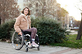 Disabled young woman in a city