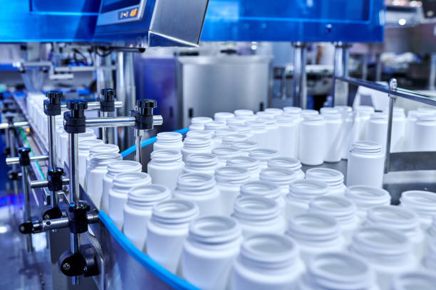 Close-up of pharmaceutical factory's production line.