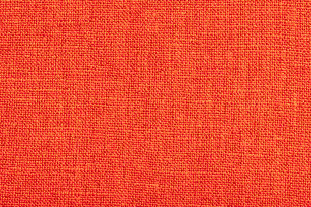 istock Smooth texture of orange linen fabric. Template for design 1598889634
