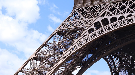 Close up Eiffel tower with clouds