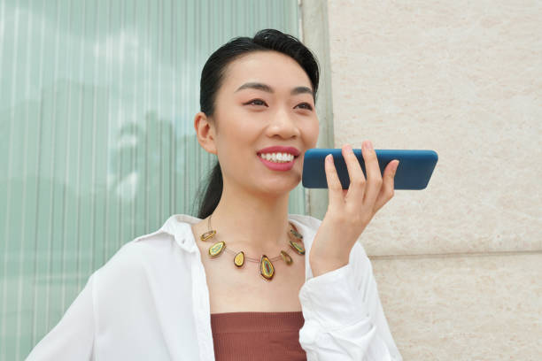 istock Vietnamese Woman Recording Voice Message 1598915643