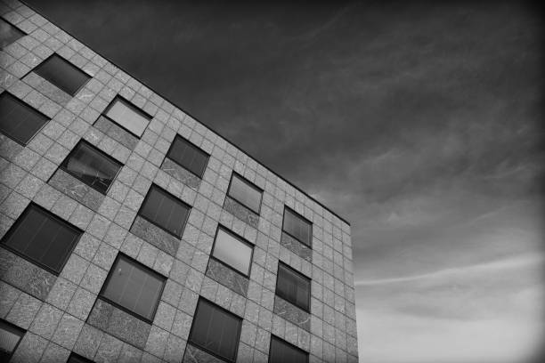 istock Low angle view of building in black and white 1599024293