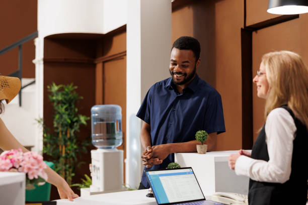 istock Man waiting for registration at hotel 1599059353