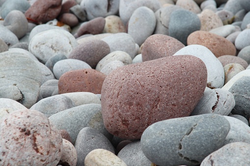 Close up of pebbles on seashore